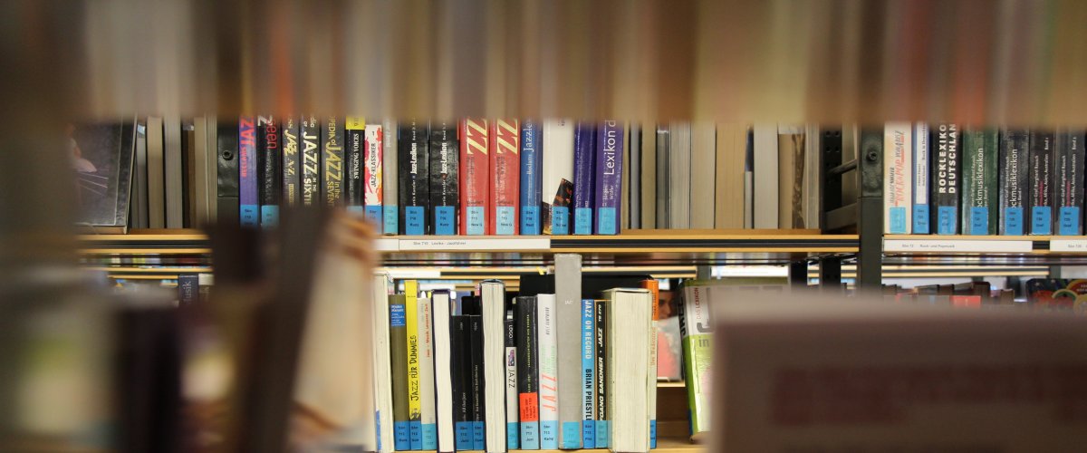 Close-up of books on the library bookshelf