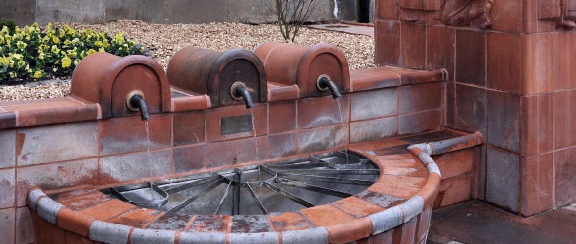 Thermal fountain in Burtscheid. Close-up of the three taps.