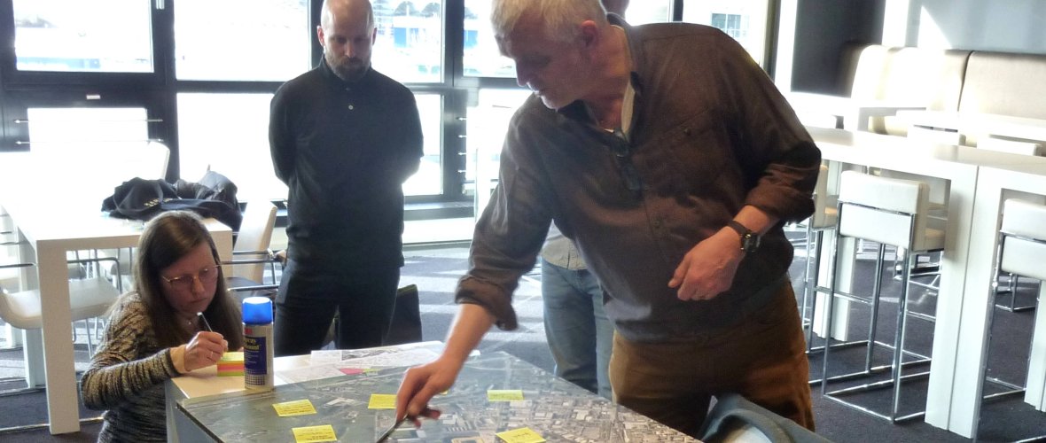 People plan and talk about a map