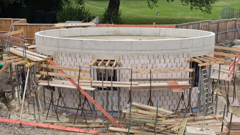 The shell of the oval ticket office building.