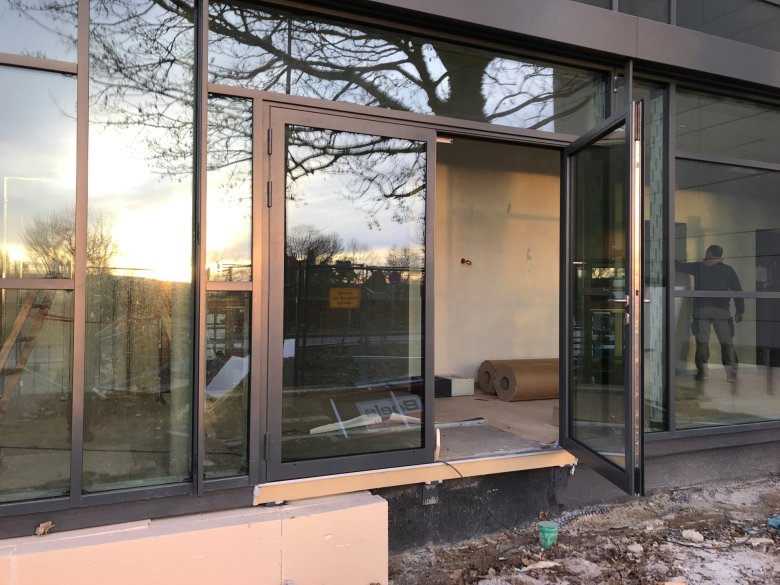 The external site doors were replaced by the steel and glass door systems.