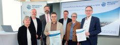 Presentation of the award, from left to right: Gabriele Hajok (Head of Facility Management), Christoph Salentin (PBS-Architekten Aachen), Jens Hausschild (Head of Facility Management), Leonidas Papadopoulos (Project Manager Facility Management), Mr. Petersdorff (Ministry MWIKE NRW) Silke Krebs (State Secretary Ministry MWIKE NRW), Heiko Thomas (Department of Environment City of Aachen)