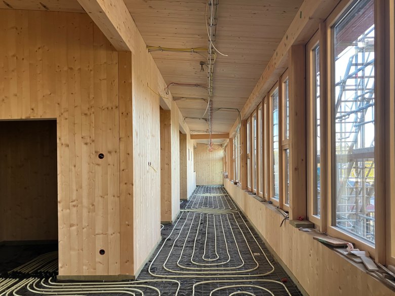 The underfloor heating in the upper floor hallway has been installed.