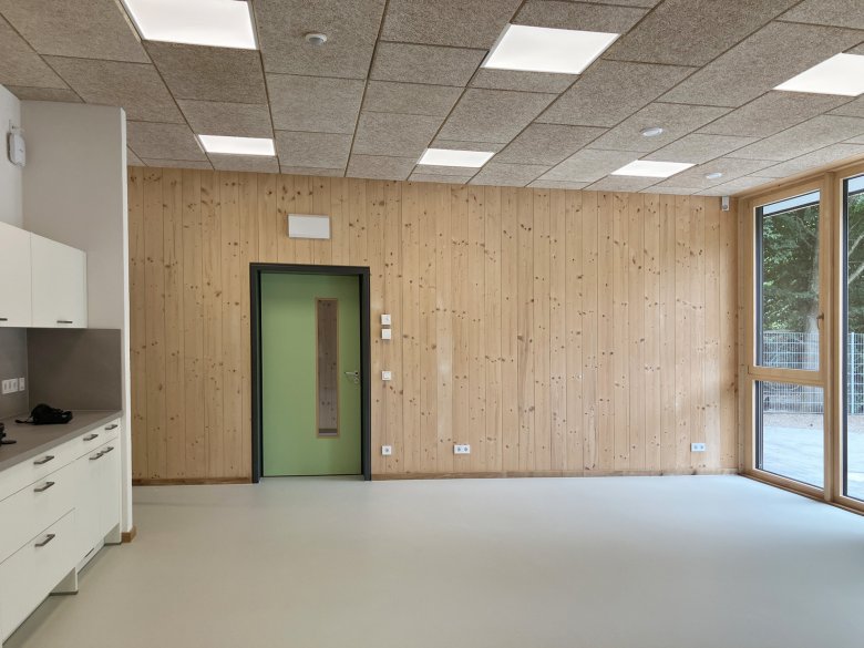 Room with a play kitchen