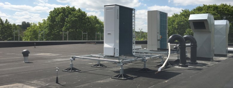 The exhaust and supply air ducts on the roof were installed.