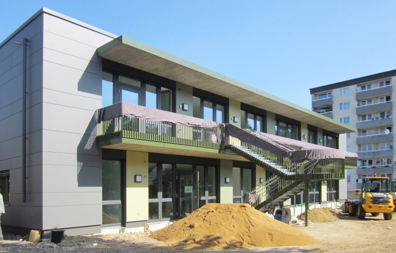 The exterior work has begun.