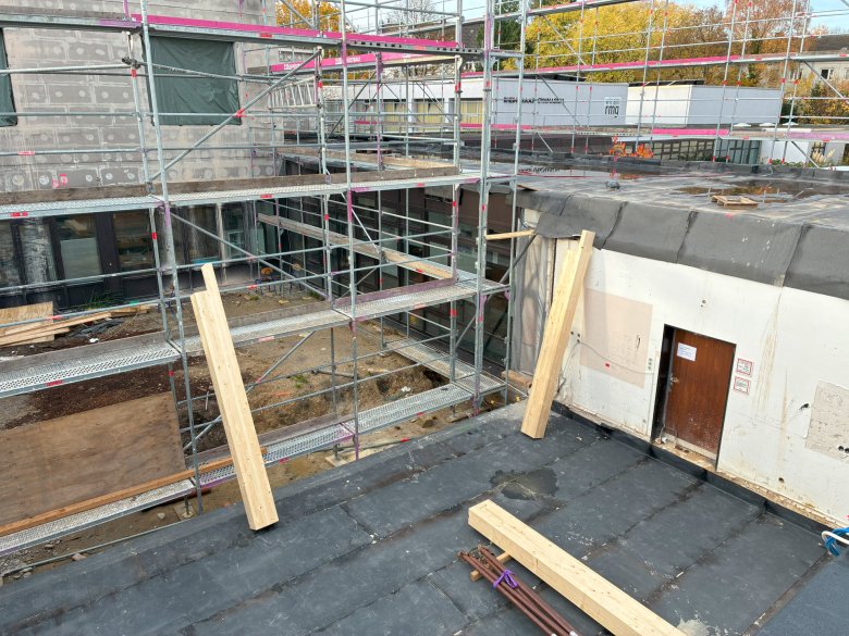 The demolished staff room is rebuilt.