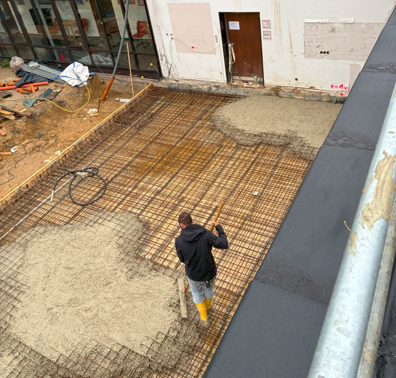 The floor slab for the new staff room is poured.