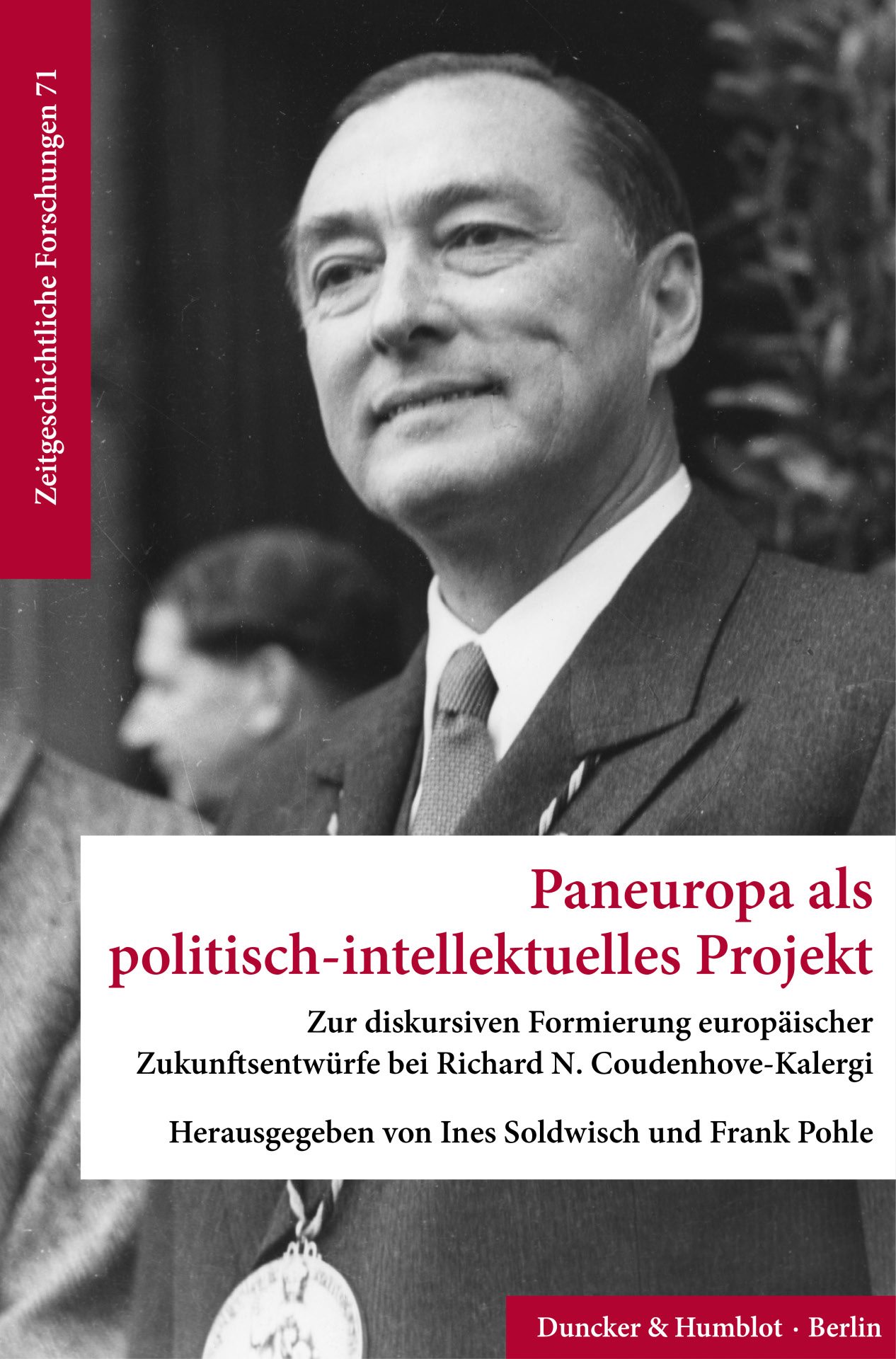 The cover of the book can be seen, on it a portrait of a man in black and white