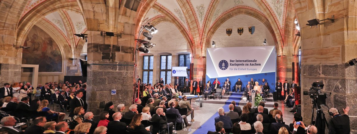 Charlemagne Prize ceremony 2023 in the Coronation Hall with stage and audience.