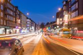 Adalbersteinweg Adalbertsteinweg at night. Many cars with lights in a blur