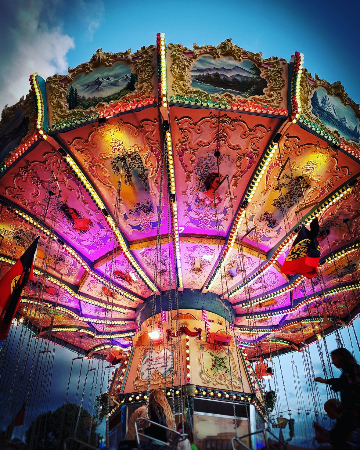 Very colorful rotating chain carousel on the Öcher Bend.