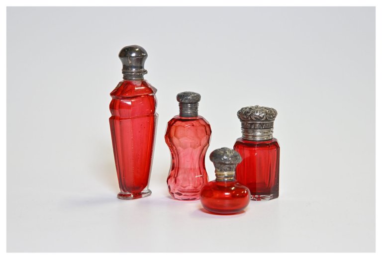 Fragrance bottle made of red ruby glass with silver lid, 19th century