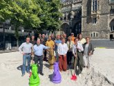 People are standing in Archimedes' sandbox