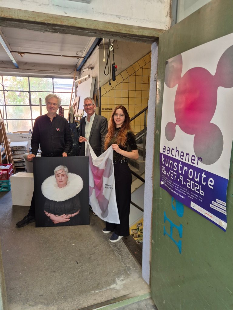 Three People with a Work of Art