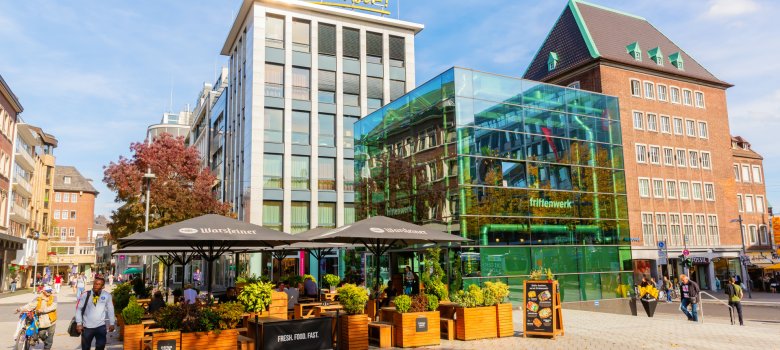 Glass cube Aachen with gastronomy