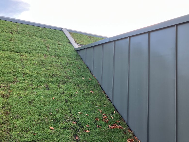 Transition entre lucarne et toit à deux pentes