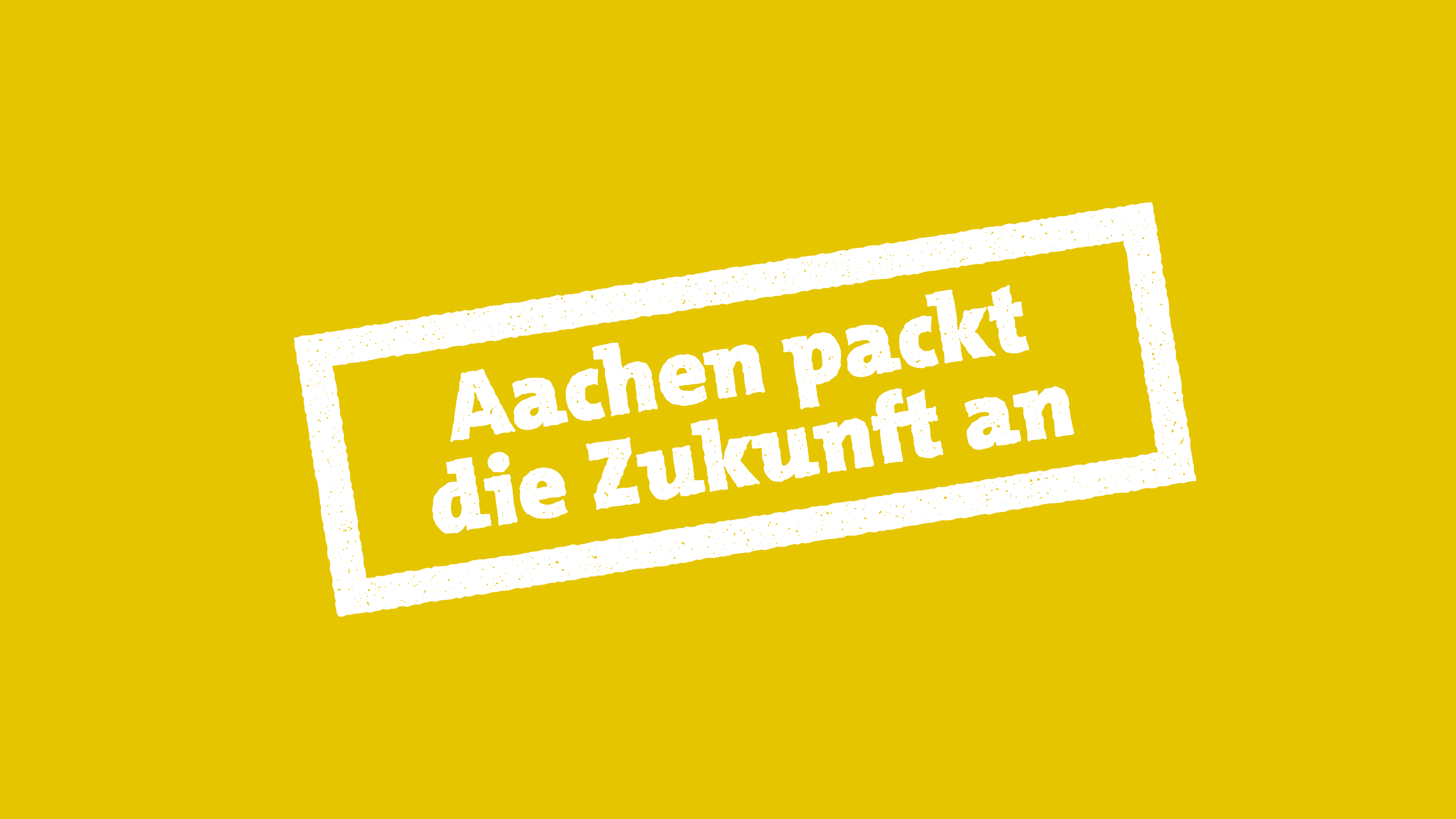Tampon Cachet avec l'inscription "Aachen packt die Zukunft an" sur fond jaune