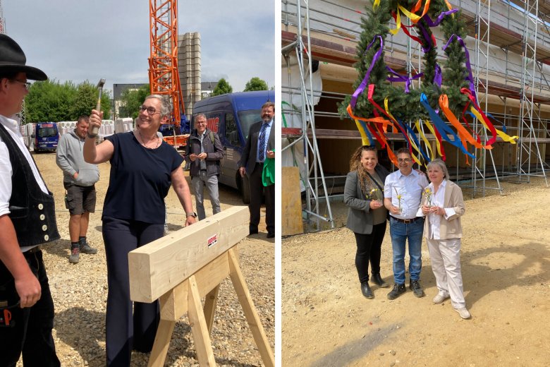 Burgemeester Keupen slaat de laatste spijker erin en het managementteam van het gebouw met de krans.