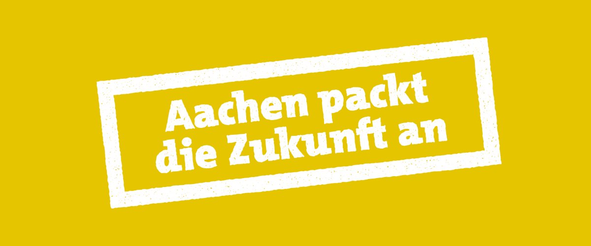 Stempel Stempel mit dem Schriftzug "Aachen packt die Zukunft an" auf gelben Grund